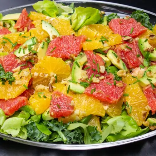 citrus salad with greens with orange and red grapefruit