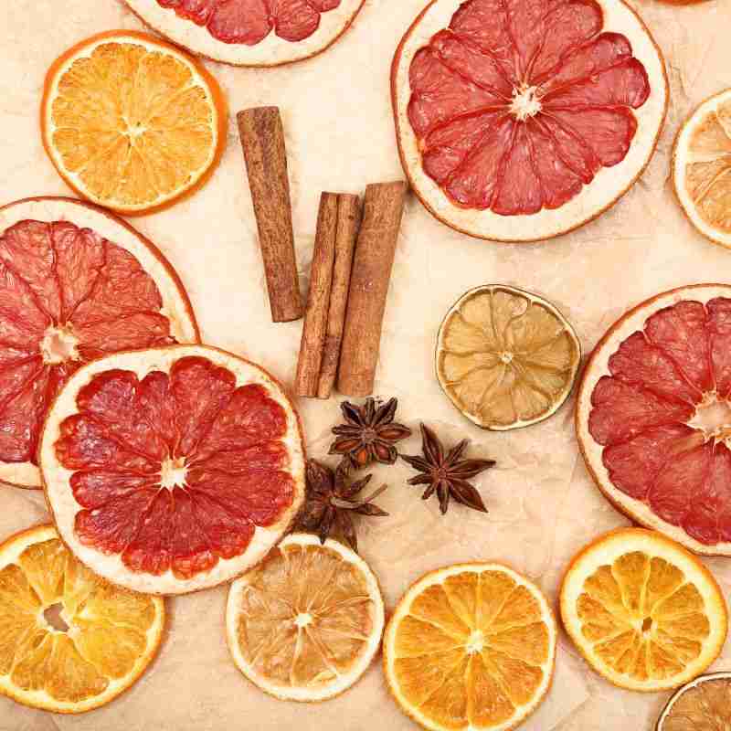 dried citrus and grapefruit slices with spices including cinnamon and star anise