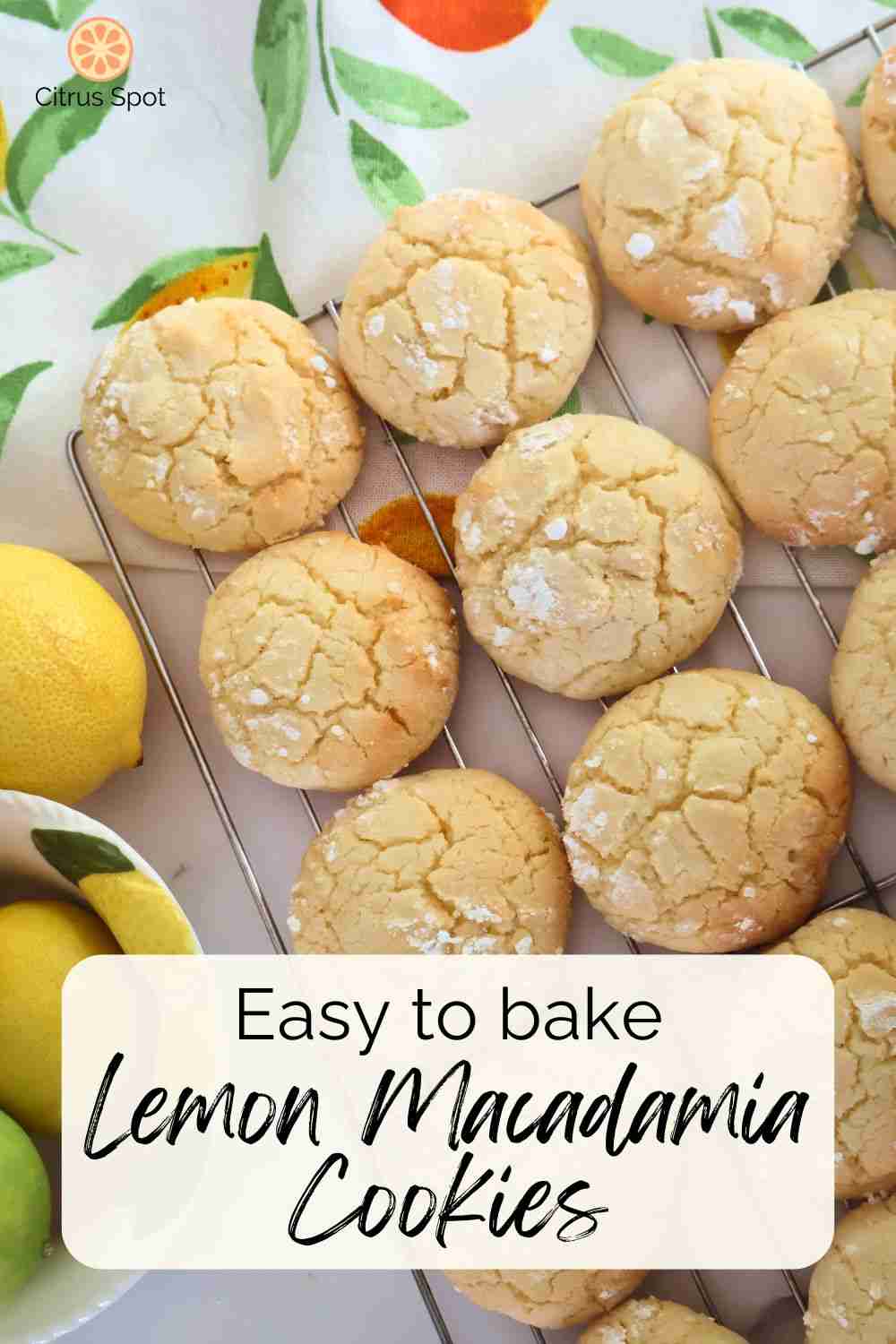 lemon macadamia cookies on wire rack with fresh lemon