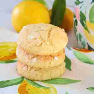 stack of 3 lemon macadamia cookies on lemon print napkin