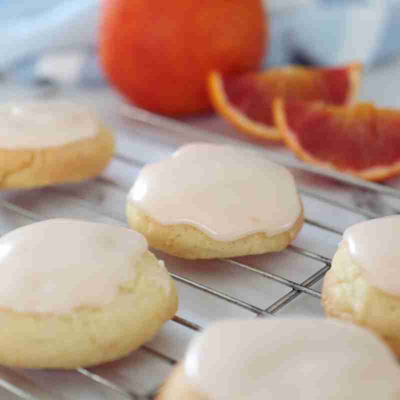 blood orange cookies with pnk citrus icing and fresh blood oranges
