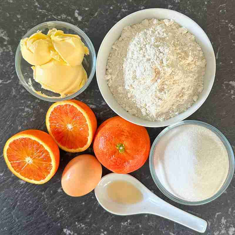 blood orange cookie ingredients including self raising flour, butter, egg, blood orange, vanilla and sugar
