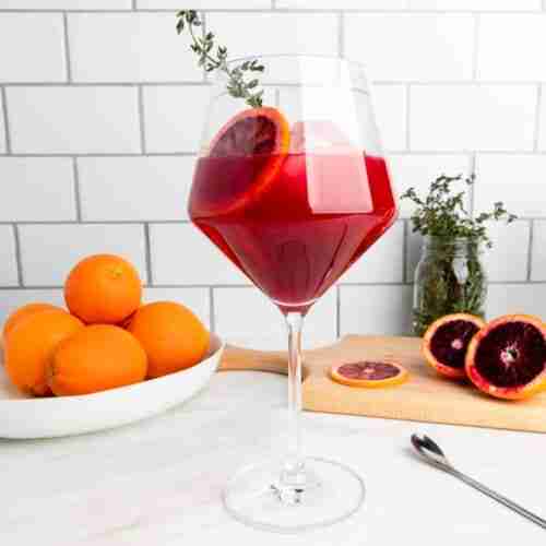 sparkling orange mocktail with thyme