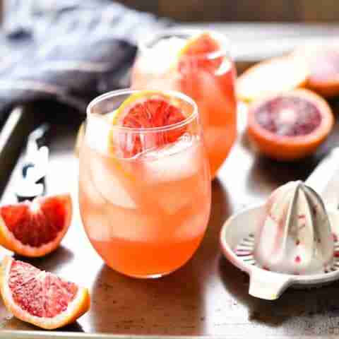 blood orange sangria with blood orange wedges