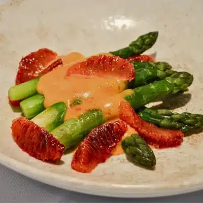 English Asparagus with sauce Mailtaise with blood orange segments