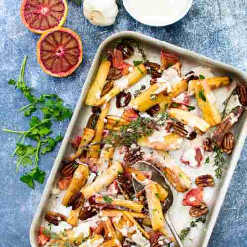 roasted parsnip and blood orange salad o tray with fresh blood oranges garlic and parsely