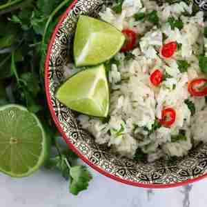 coconut and lime rice with cilantro coriander and red chili pepper