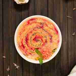 pomelo smoothie bowl on wooden board